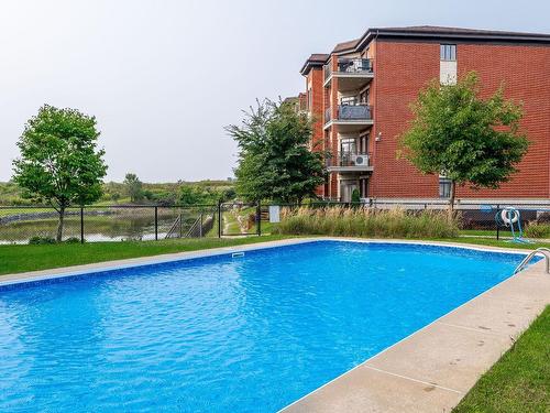 Pool - 111-100 Av. Du Golf, La Prairie, QC - Outdoor With In Ground Pool