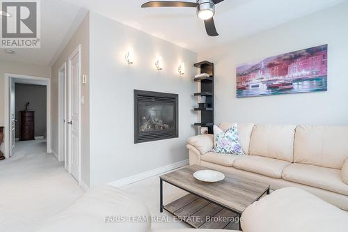 21 Duval Drive, Barrie (East Bayfield), ON - Indoor Photo Showing Living Room With Fireplace