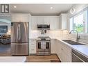 294 Marigold Road, Kelowna, BC  - Indoor Photo Showing Kitchen With Stainless Steel Kitchen With Double Sink With Upgraded Kitchen 