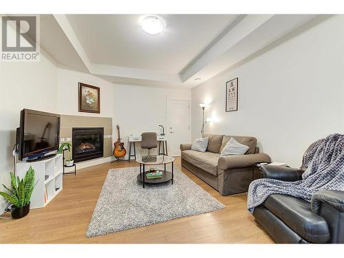 1788 Shayler Place, Kelowna, BC - Indoor Photo Showing Living Room With Fireplace