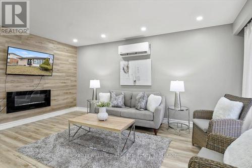 719 Central Park Boulevard N, Oshawa (Centennial), ON - Indoor Photo Showing Living Room With Fireplace