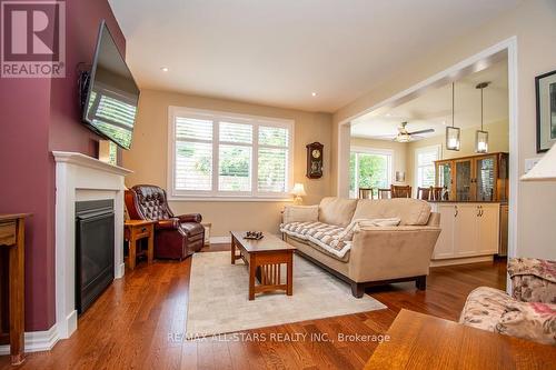 11 Sedona Court, Kawartha Lakes (Bobcaygeon), ON - Indoor Photo Showing Living Room With Fireplace