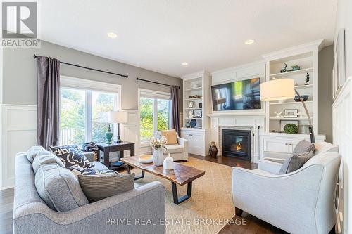 56 Fieldstone Crescent S, Middlesex Centre (Komoka), ON - Indoor Photo Showing Living Room With Fireplace