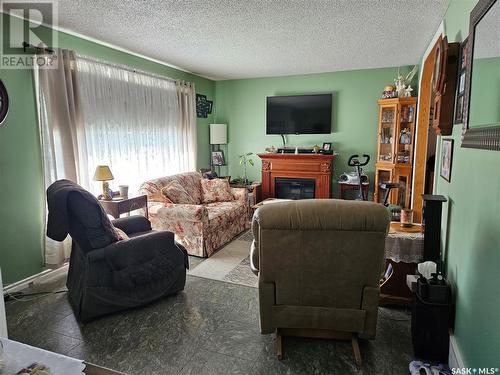 1438 Spadina Street W, Moose Jaw, SK - Indoor Photo Showing Living Room With Fireplace