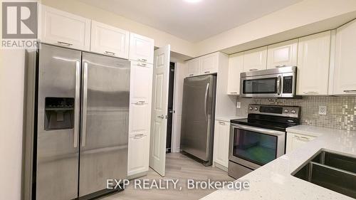 2530 - 3888 Duke Of York Boulevard S, Mississauga, ON - Indoor Photo Showing Kitchen With Double Sink