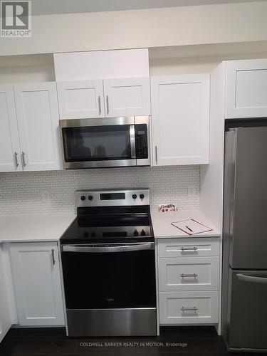 909 - 128 King Street N, Waterloo, ON - Indoor Photo Showing Kitchen