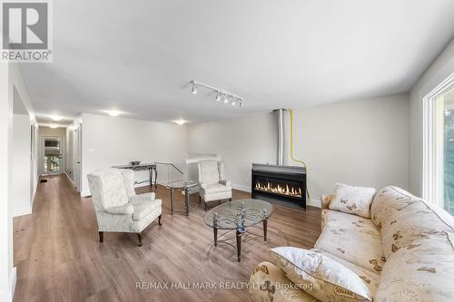 2422 Snow Valley Road, Springwater (Snow Valley), ON - Indoor Photo Showing Living Room With Fireplace