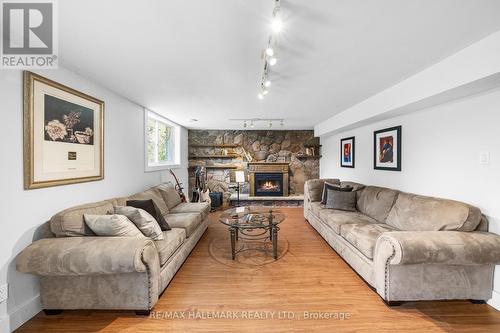 2422 Snow Valley Road, Springwater (Snow Valley), ON - Indoor Photo Showing Living Room With Fireplace