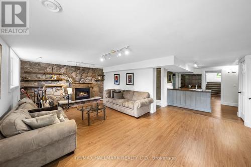 2422 Snow Valley Road, Springwater (Snow Valley), ON - Indoor Photo Showing Living Room With Fireplace