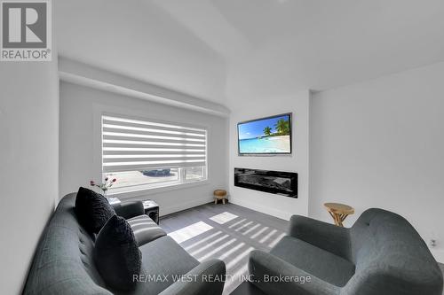 759 Essa Road, Barrie (Holly), ON - Indoor Photo Showing Living Room With Fireplace