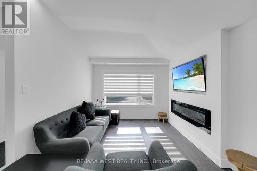 759 Essa Road, Barrie (Holly), ON - Indoor Photo Showing Living Room With Fireplace