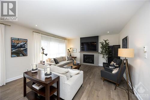 204 Sunset Crescent, Russell, ON - Indoor Photo Showing Living Room With Fireplace