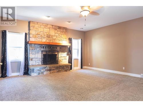 6383 Postill Lake Road Lot# Lot 2, Kelowna, BC - Indoor Photo Showing Living Room With Fireplace