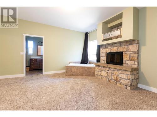 6383 Postill Lake Road Lot# Lot 2, Kelowna, BC - Indoor Photo Showing Other Room With Fireplace