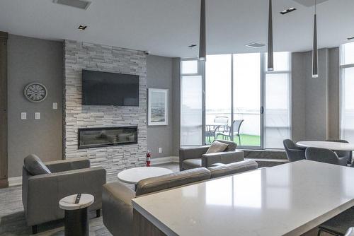 1276 Maple Crossing Boulevard|Unit #Ph3, Burlington, ON - Indoor Photo Showing Living Room With Fireplace