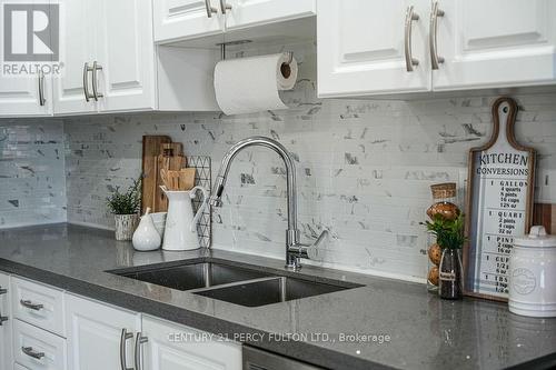 1215 - 20 Dean Park Road, Toronto (Rouge), ON - Indoor Photo Showing Kitchen With Double Sink