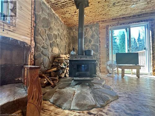 1348 Peddlers Dr, Mattawa, ON - Indoor With Fireplace