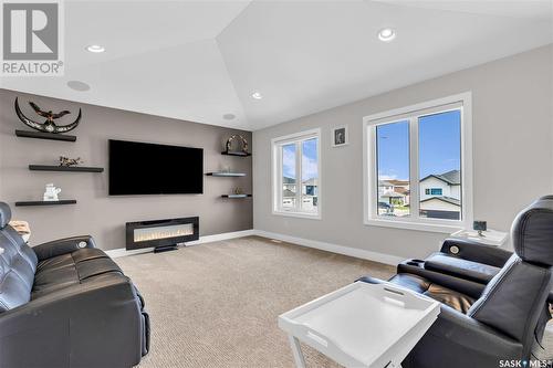 351 Fast Court, Saskatoon, SK - Indoor Photo Showing Living Room With Fireplace