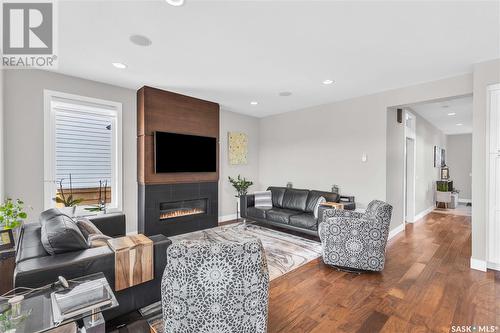 351 Fast Court, Saskatoon, SK - Indoor Photo Showing Living Room With Fireplace