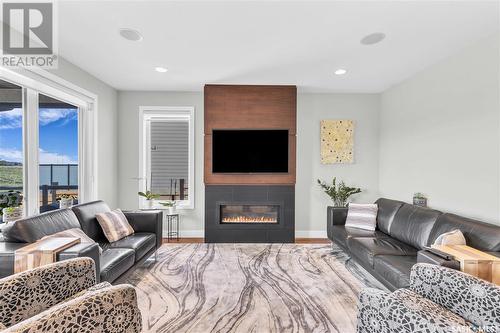 351 Fast Court, Saskatoon, SK - Indoor Photo Showing Living Room With Fireplace