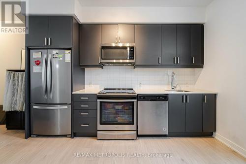 321 - 8 Nahani Way, Mississauga, ON - Indoor Photo Showing Kitchen With Stainless Steel Kitchen