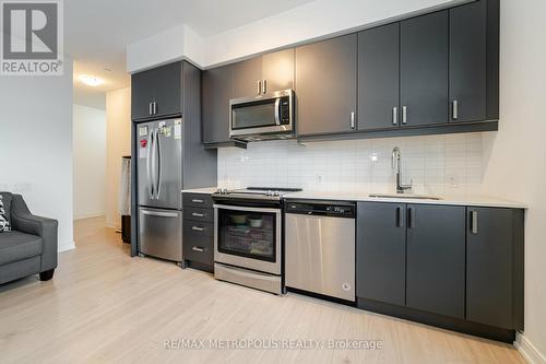 321 - 8 Nahani Way, Mississauga, ON - Indoor Photo Showing Kitchen With Stainless Steel Kitchen