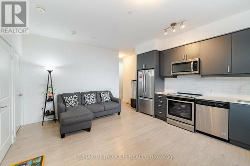 321 - 8 Nahani Way, Mississauga, ON - Indoor Photo Showing Kitchen With Stainless Steel Kitchen