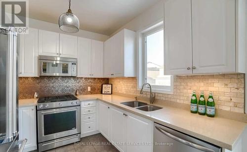 67 - 651 Farmstead Drive, Milton (Willmott), ON - Indoor Photo Showing Kitchen With Double Sink