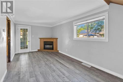 1068 Ford, Windsor, ON - Indoor Photo Showing Living Room With Fireplace