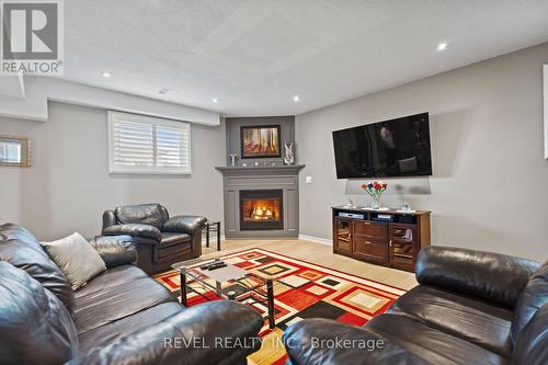 4045 Fieldstone Avenue, Niagara Falls, ON - Indoor Photo Showing Living Room With Fireplace