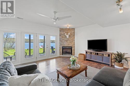 121 North Deer Lake, Huntsville, ON - Indoor Photo Showing Living Room With Fireplace