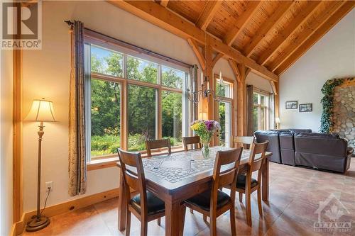 Big windows give every room a great view of the yard. - 698 Moffat Street, Pembroke, ON - Indoor Photo Showing Dining Room