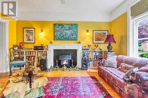 572 Charlotte Street, Peterborough (Downtown), ON - Indoor Photo Showing Living Room With Fireplace