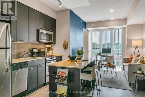 406 - 2055 Danforth Avenue, Toronto (Woodbine Corridor), ON - Indoor Photo Showing Kitchen