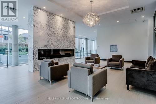 406 - 2055 Danforth Avenue, Toronto (Woodbine Corridor), ON - Indoor Photo Showing Other Room With Fireplace