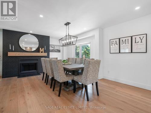 2308 Victoria Street S, Innisfil (Stroud), ON - Indoor Photo Showing Dining Room With Fireplace