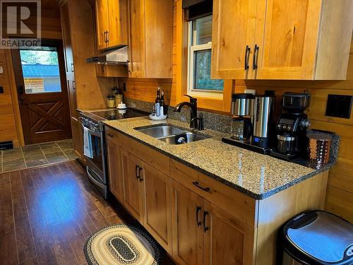 87 Larson Road, Christina Lake, BC - Indoor Photo Showing Kitchen With Double Sink