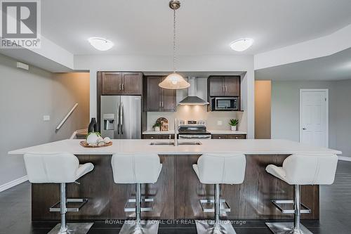 58 - 107 Westra Drive, Guelph/Eramosa, ON - Indoor Photo Showing Kitchen With Double Sink With Upgraded Kitchen