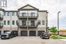 58 - 107 Westra Drive, Guelph/Eramosa, ON  - Outdoor With Balcony With Facade 