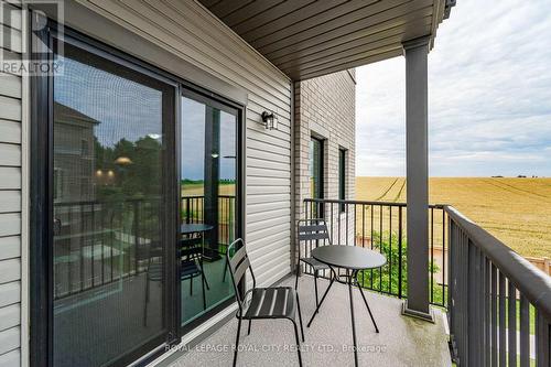 58 - 107 Westra Drive, Guelph/Eramosa, ON - Outdoor With Balcony With Exterior