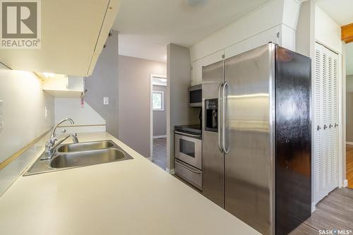 95 Mcinnis Crescent, Regina, SK - Indoor Photo Showing Kitchen With Stainless Steel Kitchen With Double Sink