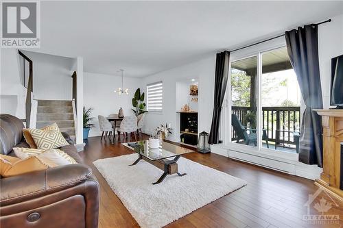 Patio door leading to large balcony - 1014 Tanguay Court, Ottawa, ON - Indoor Photo Showing Living Room