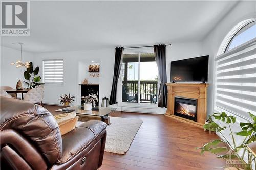 1014 Tanguay Court, Ottawa, ON - Indoor Photo Showing Living Room With Fireplace