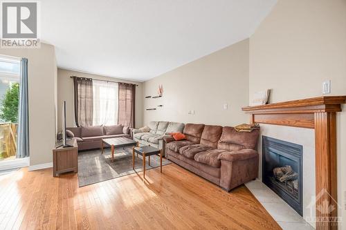 334 Grammond Circle, Ottawa, ON - Indoor Photo Showing Living Room With Fireplace