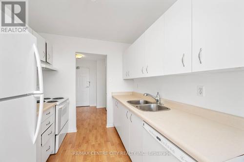 602 - 333 Commissioners Road W, London, ON - Indoor Photo Showing Kitchen With Double Sink