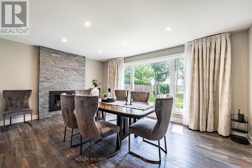 4310 Line 6, Bradford West Gwillimbury (Bradford), ON - Indoor Photo Showing Dining Room With Fireplace