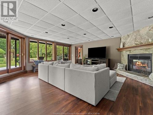 1339 County Rd 27, Lakeshore, ON - Indoor Photo Showing Living Room With Fireplace