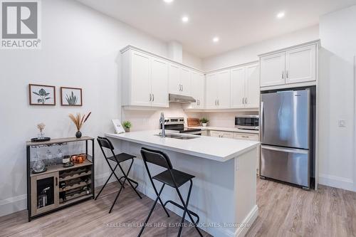 109 - 30 Hamilton Street S, Hamilton (Waterdown), ON - Indoor Photo Showing Kitchen With Stainless Steel Kitchen