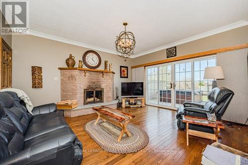 8108 Wellington Rd 22, Centre Wellington, ON - Indoor Photo Showing Living Room With Fireplace