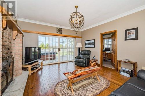 8108 Wellington Rd 22, Centre Wellington, ON - Indoor Photo Showing Living Room With Fireplace